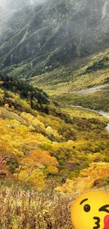 Vibrant autumn mountain valley with colorful foliage and a winding river.