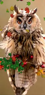 Owl perched on a branch with autumn leaves.