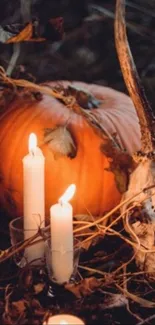 Pumpkins and candles create cozy autumn vibes.