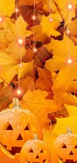 Vibrant autumn wallpaper with pumpkins and glowing lights on orange leaves.