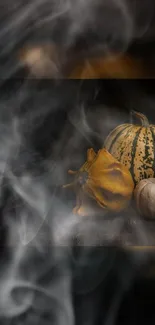 Moody autumn wallpaper with pumpkins and smoke, perfect for fall aesthetic.