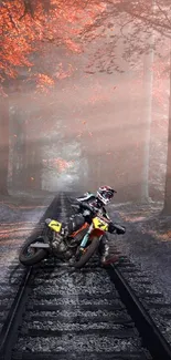 Motocross ride on forest trail with autumn leaves.