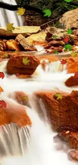 Autumn waterfall with colorful leaves and river rocks in a serene nature scene.