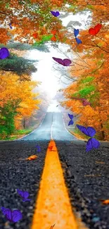 Scenic road through autumn forest with vibrant orange leaves.