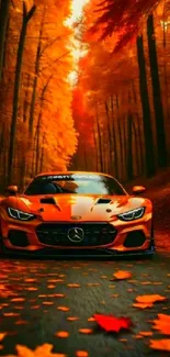 Orange sports car on autumn leaf-covered road in a forest.