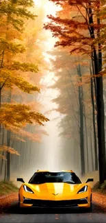 Yellow sports car on autumn forest road with vibrant leaves.
