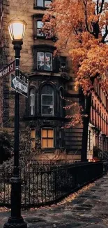 Autumn city street with vintage building and orange foliage.