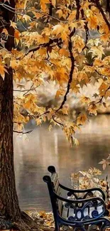 Autumn scene with bench by lake, golden leaves.