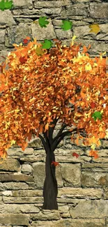 Autumn tree with orange leaves on a stone wall background.