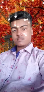 Young man with autumn foliage background.