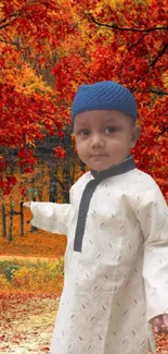 Child in traditional wear amidst vibrant autumn forest.