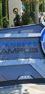 Avengers Campus sign with vibrant blue accents and modern design.