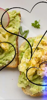Avocado toast with artistic heart design on white plate.