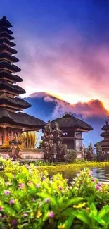 Beautiful Bali temple by the lake at sunset with vibrant purple sky.