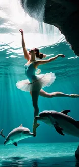 Ballerina performing underwater with dolphins in a serene teal setting.