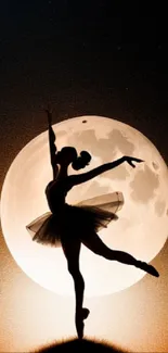 Silhouette of a dancer under a luminous full moon at night.