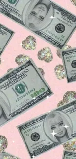 Barbie money and glitter hearts on a pink background.