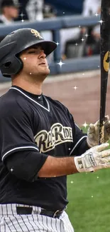 Baseball player in action on the field, holding a bat and ready to play.