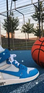 Blue sneakers and basketball in court setting wallpaper.