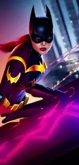 Batgirl poses with neon lights in urban cityscape.