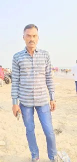 Man in casual outfit on sunny beach