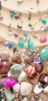 Mobile wallpaper with colorful pebbles and shells on sand.