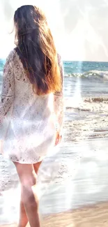 Woman in lace dress walking on a serene beach.