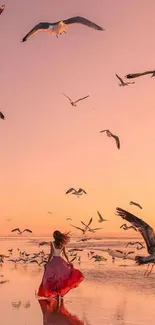 A woman on a beach at sunset with seagulls flying around.