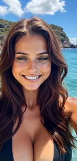Woman smiling at a beach with blue ocean