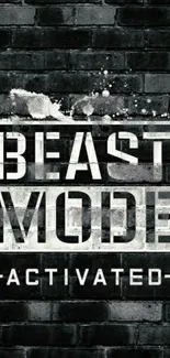 'Beast Mode Activated' on dark brick wall wallpaper.