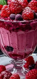 Berry dessert in glass with vibrant fruits