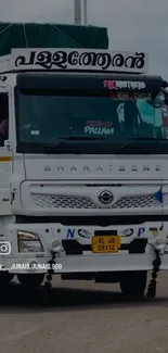 BharatBenz truck driving on a highway road