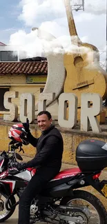 Motorcyclist by El Socorro landmark, vibrant cultural scenery.