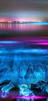 Bioluminescent waves glowing at night with vibrant blue and pink hues.