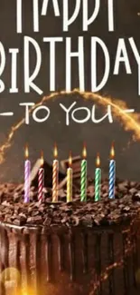 Artistic chocolate cake with candles celebrating a birthday.