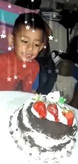 Happy child with birthday cake and stars in a festive wallpaper.