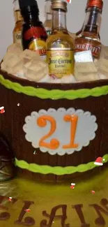 A 21st birthday cake with mini liquor bottles on top.