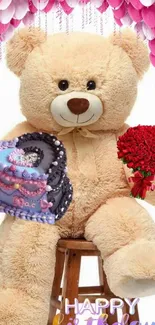 Giant teddy bear with cake, roses, and balloons.