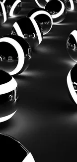 Black and white abstract 3D spheres wallpaper with glossy finish.