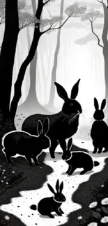 Black and white forest with rabbits in silhouette.