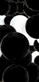 Black and white spheres pattern wallpaper for mobile.