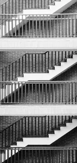 Monochrome photo of a patterned staircase with brick wall background.