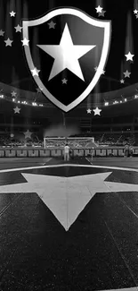 Black and white wallpaper with star emblem in a stadium setting.