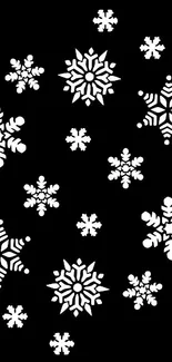 Black wallpaper with elegant white snowflakes.