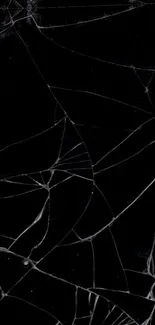 Black cracked glass wallpaper for mobile devices.