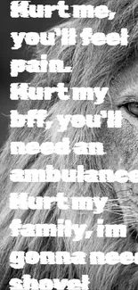 Black and white lion with motivational quote on courage and strength.