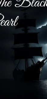 Silhouette of Black Pearl against a stormy night sky.