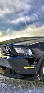 Black sports car parked under a cloudy scenic sky.