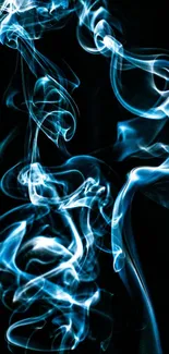 Elegant blue smoke swirling on black background, creating a dynamic abstract design.