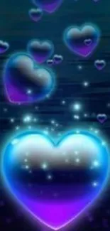 Glowing blue and purple heart wallpaper with sparkling effects.